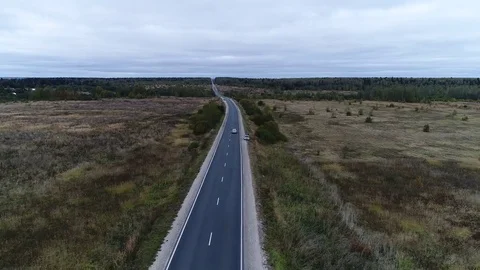 Flying along the road in the field 動画素材 80808959