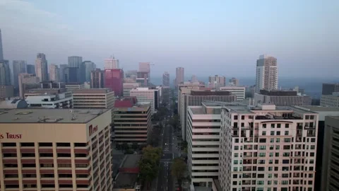 Flying along rooftops downtown Edmonton Stock Footage 250500716