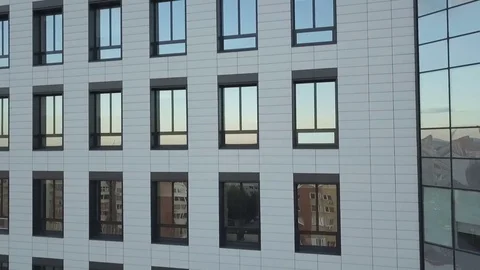 Flying along the skyscraper's facade Stock Footage 80687857