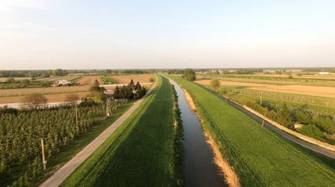 Flying along a small river Stock Footage 89451351