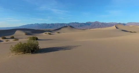 Flying alongside Mesquite Flat Sand Dunes in Death Valley, California Stock Footage 72970044