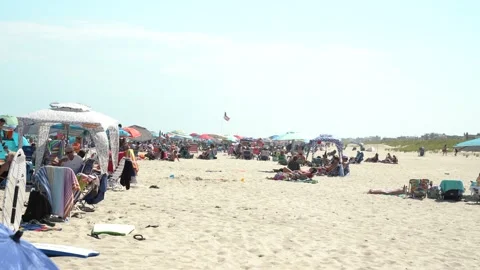 Flying American Flag on beach Stock Footage 140999646