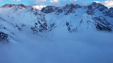 Flying among the ocean of clouds in the mountains Video stock 225428410