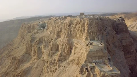 Flying up at ancient remains of masada Stock Footage 101072339