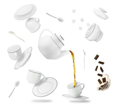 Flying and falling tea cups, teapot 스톡 사진