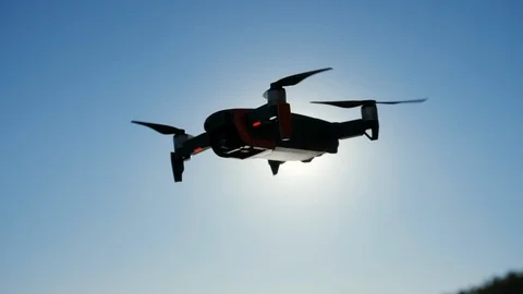 Flying and filming with drone camera. Copter flies near the sea, takes photos Stock Footage 108487109