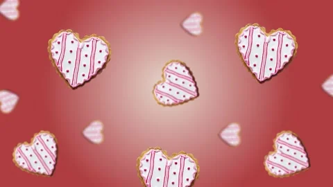 Flying and wiggle of different diameters many hearts shaped gingerbread Stock Footage 168588693