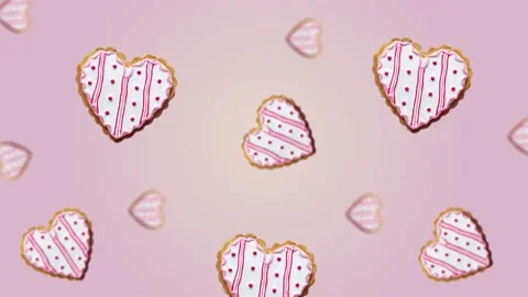 Flying and wiggle of different diameters many hearts shaped gingerbread Stock Footage 168588824