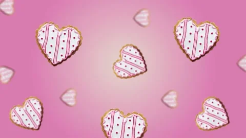 Flying and wiggle of different diameters many hearts shaped gingerbread Stock Footage 168588835