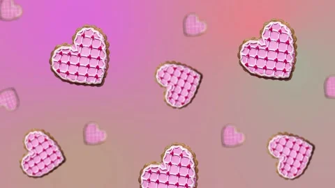 Flying and wiggle of different diameters many hearts shaped gingerbread Stock Footage 168588938