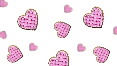 Flying and wiggle of different diameters many hearts shaped gingerbread Video stock 168588948