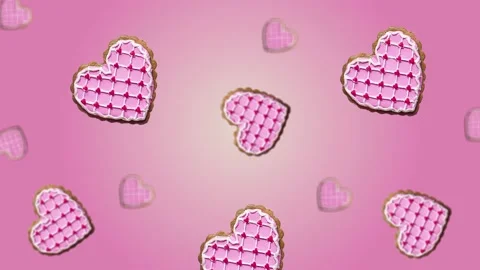 Flying and wiggle of different diameters many hearts shaped gingerbread Stock Footage 168588965