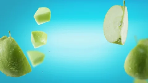 Flying of Apple and Slices in Ice Blue Background Stock Footage 123504161