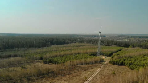 Flying in an arc of a single wind generator with a rotating three-bladed 動画素材 107805635