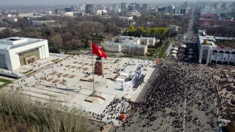 Flying around Ala-Too central main square of country. Nooruz celebration Stock Footage 300751296