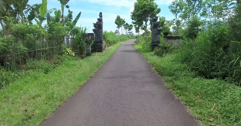 Flying around back roads of Bali on mountain top Stock Footage 73100830