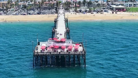 Flying around Balboa Beach, hovering in front of Newport Beach Balboa Pier Stock Footage 340075775
