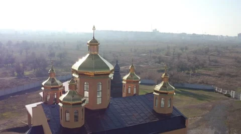 Flying around the church golden domes sparkling in the sun Stock Footage