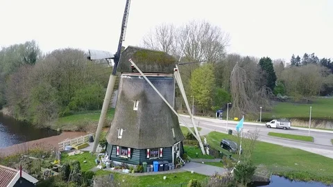 Flying around Dutch windmill Stock Footage 101847663