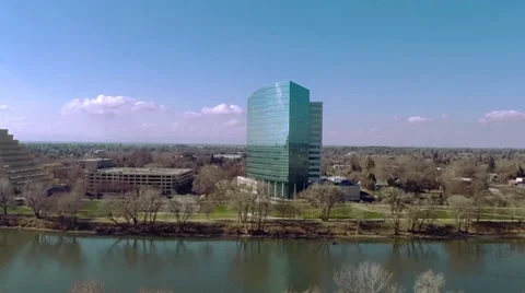 Flying around a glass skyscraper Stock Footage 35728241