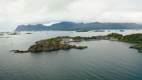 Flying around the Hamn i Senja village l... | Stock Video | Pond5