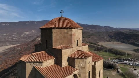 Flying around the historic Jvari monastery in Mtskheta city Stock Footage 222604368