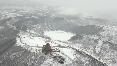 Flying around the historic Jvari monastery near Mtskheta in eastern Georgia Stock Footage 237637896