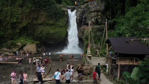 Flying around a large waterfall in Bali Indonesia Stock Footage 102535496