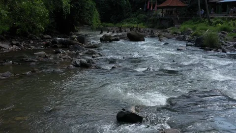 Flying around a large waterfall in Bali Indonesia Stock Footage 102537314