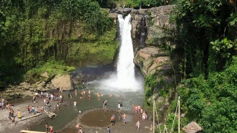 Flying around a large waterfall in Bali Indonesia Stock Footage 102540505