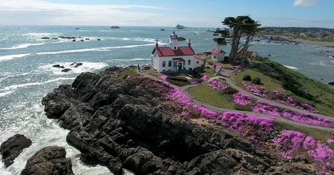 Flying around lighthouse at Crescent City, CA Stock Footage 73098347