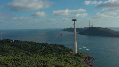 Flying around long big cable car and five speed boats floating fast on sea water Stock Footage 124367288