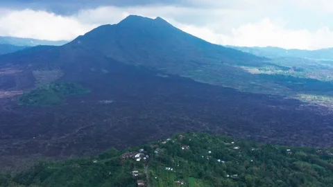 Flying around Mount Batur, an active Volcano in Bali Indonesia days after Stock Footage 102532606