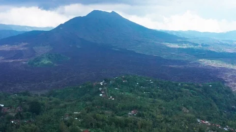 Flying around Mount Batur, an active Volcano in Bali Indonesia days after Stock Footage 102533076