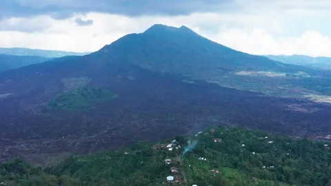 Flying around Mount Batur, an active Volcano in Bali Indonesia days after Stock-Footage 102536064