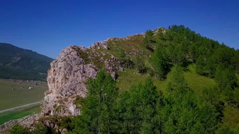 Flying around the mountain Stock Footage 166480789