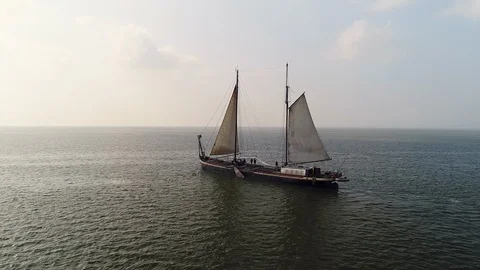 Flying around old two mast sailing ship - aerial Stock Footage 103353713
