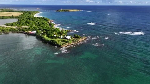 Flying around Pointe de Salines with famous Salines Beach, a sandy beach Stock Footage 324788130