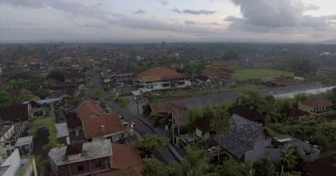 Flying around rice fields around the town of Ubud, Bali Stock Footage 73100748