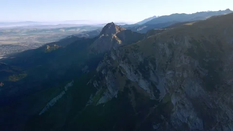 Flying around the rounded peak of Ciemniak Stock Footage 170234820