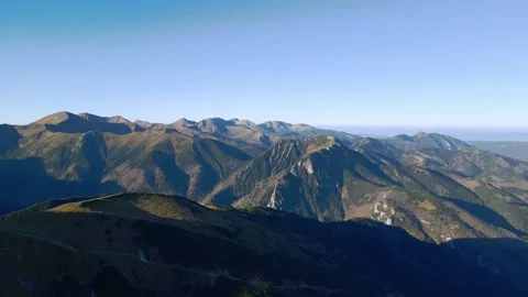 Flying around the rounded peak of Ciemniak, with a far-reaching views Stock Footage 170294524
