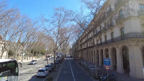 Flying around the streets of Barcelona Stock Footage 302364458