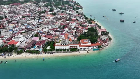 Flying around the tip area of historic Stone Town, the oldest part of Zanzibar  Vídeos de archivo 289061866