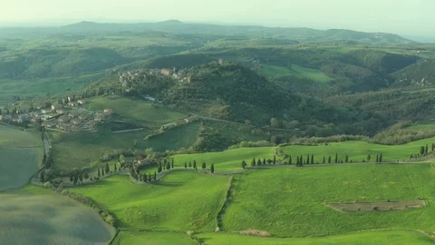 Flying around the town of Monticchiello in spring in Italy 3 Stock Footage 129447303