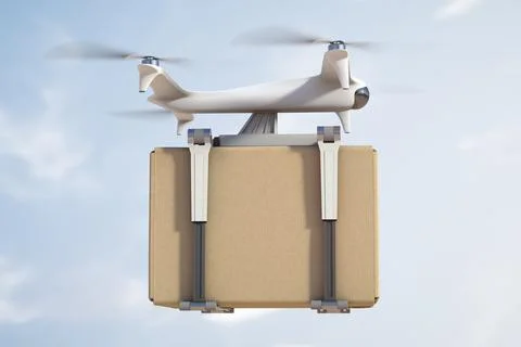 Flying automatic drone transports a box Foto stock