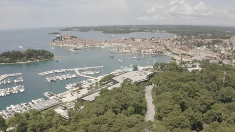 Flying Away Drone View of Rovinj Old Town and Adriatic Coast, Croatia Stock Footage 344039769