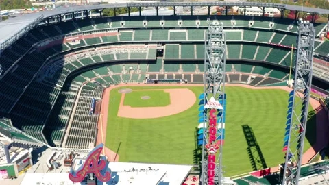 Flying away from the empty field of Truist Park Stadium in Atlanta Georgia Stock Footage 334319599
