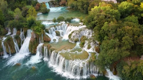 Flying away high up from the beautiful Krka Waterfalls in Krka National Park Video stock 219027319