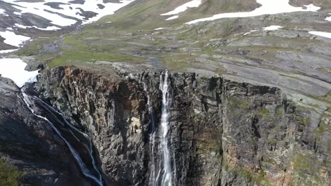 Flying away from a waterfall in the mountains Vídeo Stock 276438501