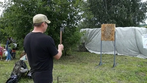 Flying axe, Man is throwing an ax Stock Footage 79503201